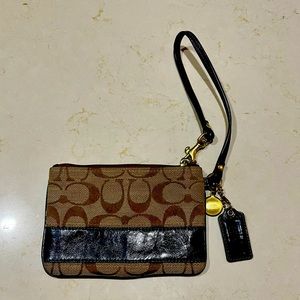 Coach wristlet with classic C pattern